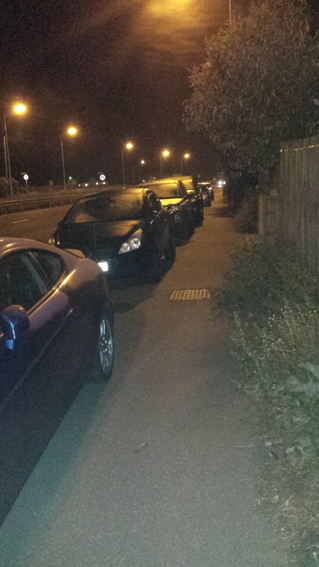 Orchard Road and pavement obstruction at night